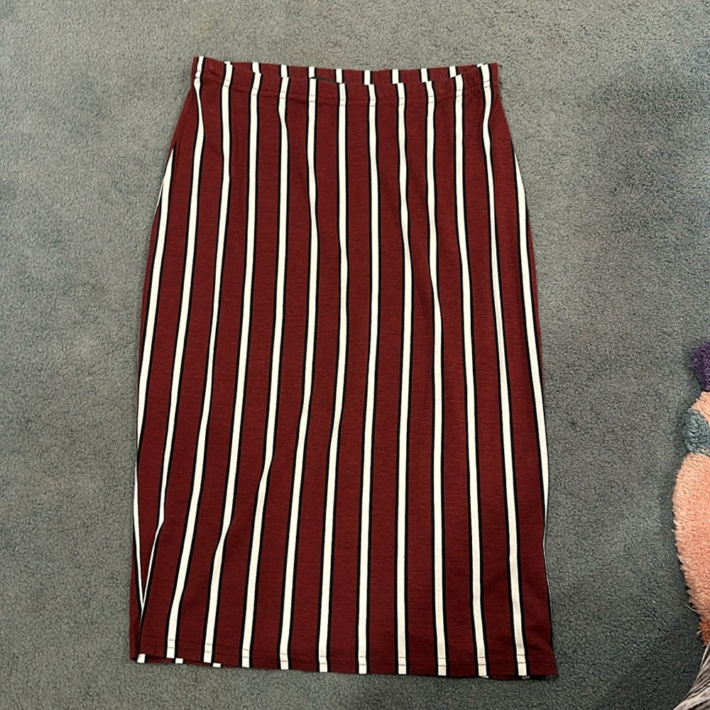 Super comfortable and flattering midi pinstripe pencil skirt.